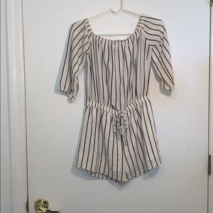 Cute black and white romper!  Size M